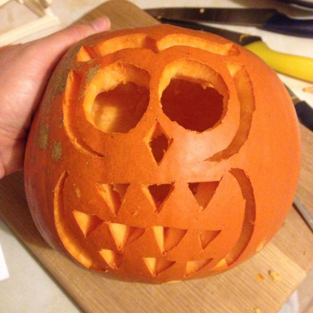 Carving the owl pumpkin