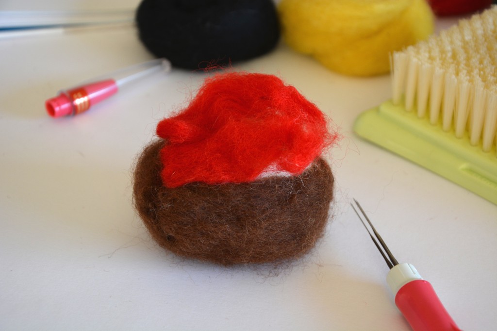 Adding the red wool