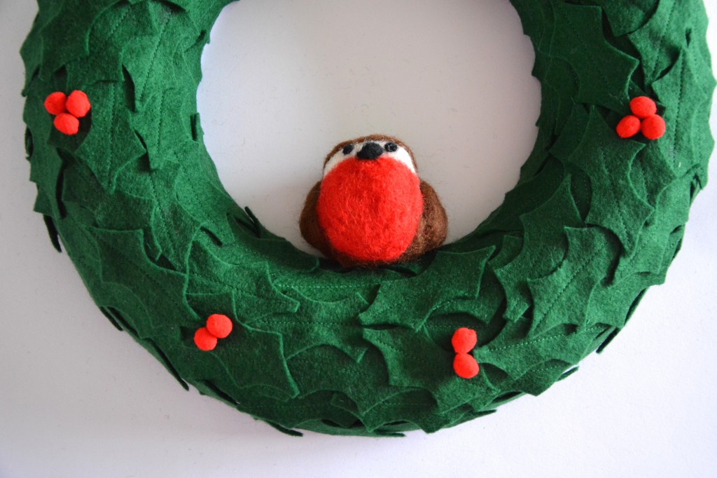 Attaching the robin to the wreath