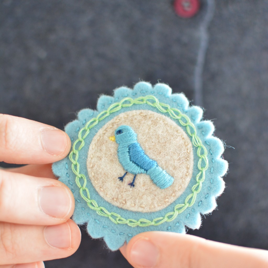 Felt bird brooch