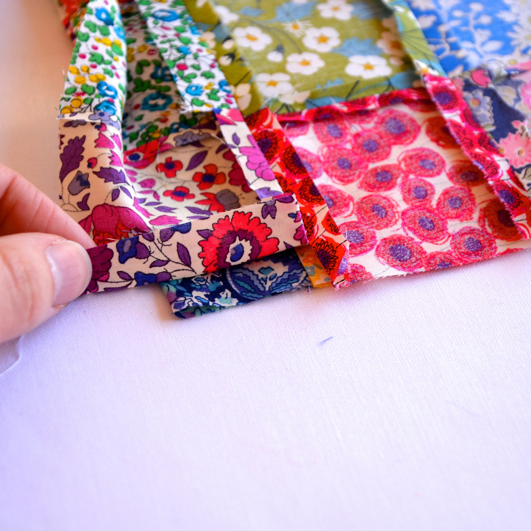 Cut 1.5cm along the edge of the first seam