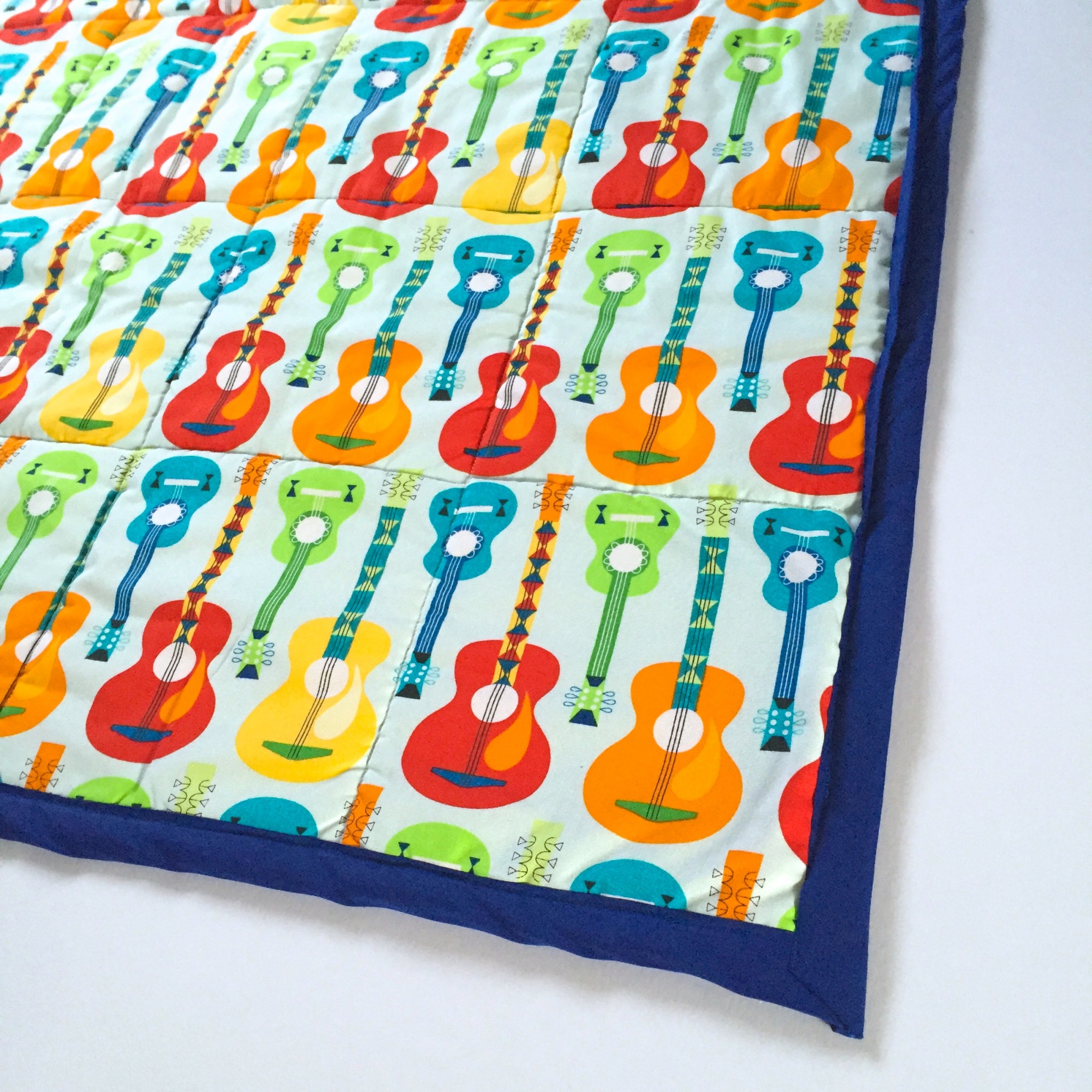 Guitar quilt backing