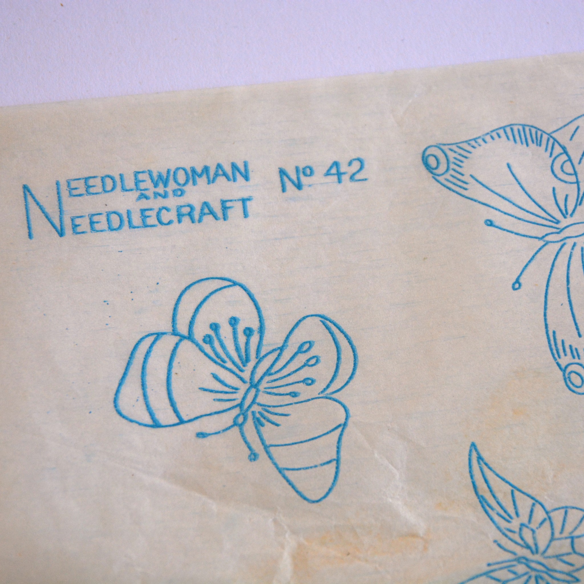 Needlewoman and Needlecraft