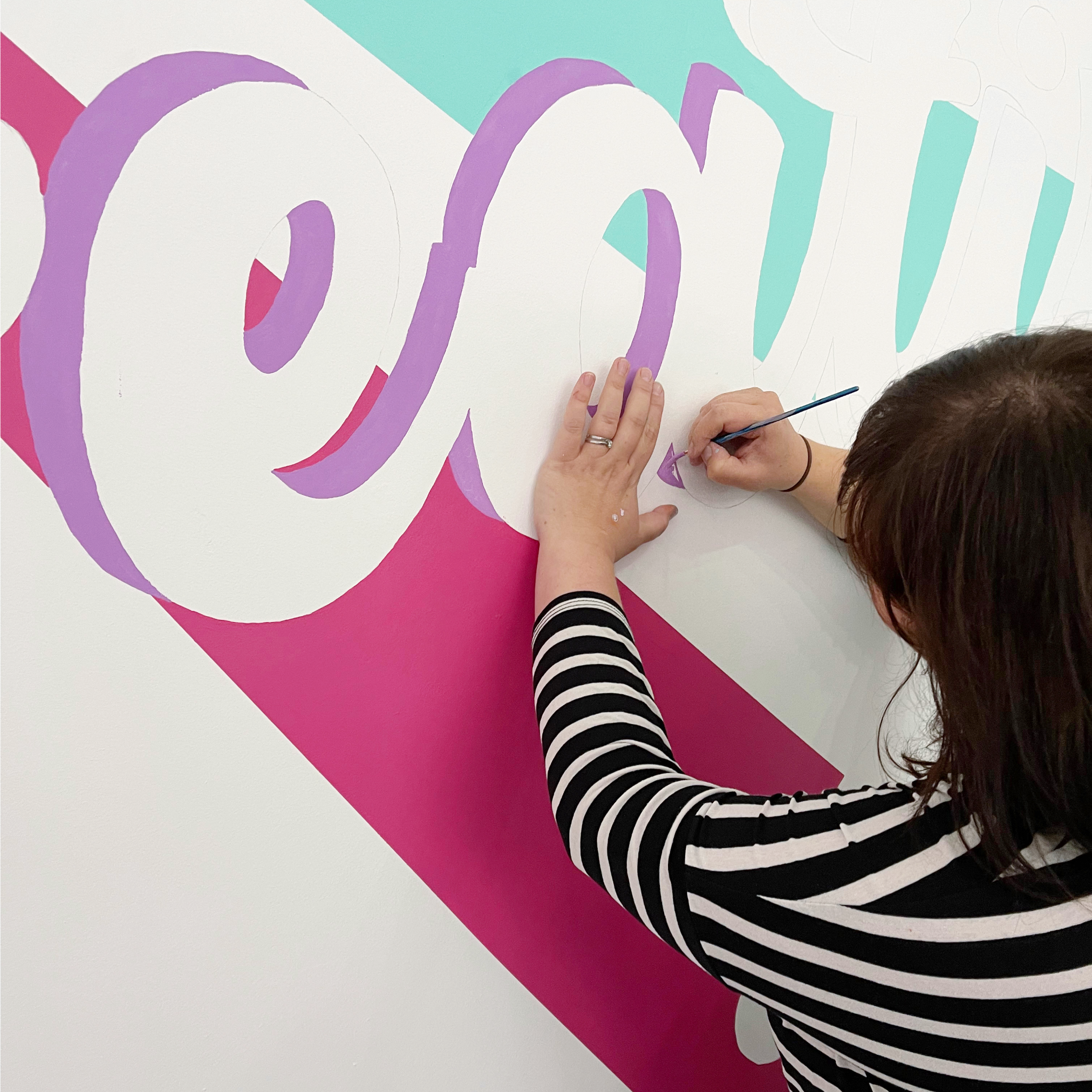 Painting the Studio Dariolina mural